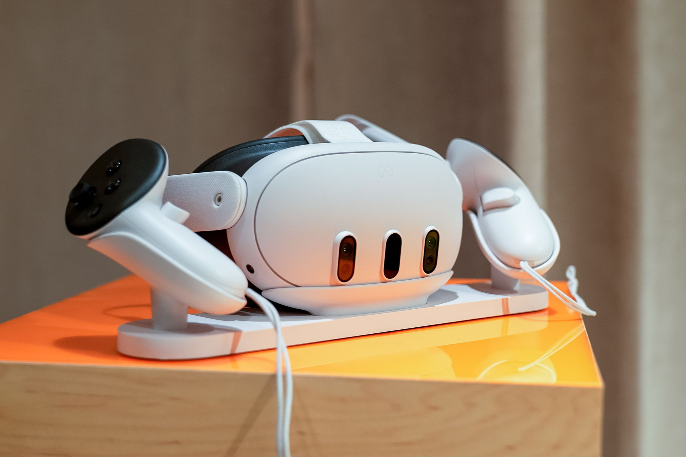The Quest 3 on a charging dock