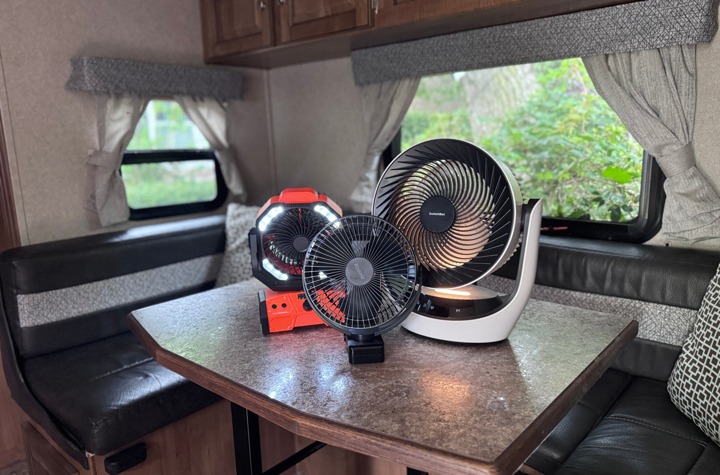 Battery-powered fans for the win! The two Koonie fans (left) and the Switchbot fan (right) kept us cool during the hot summer nights.