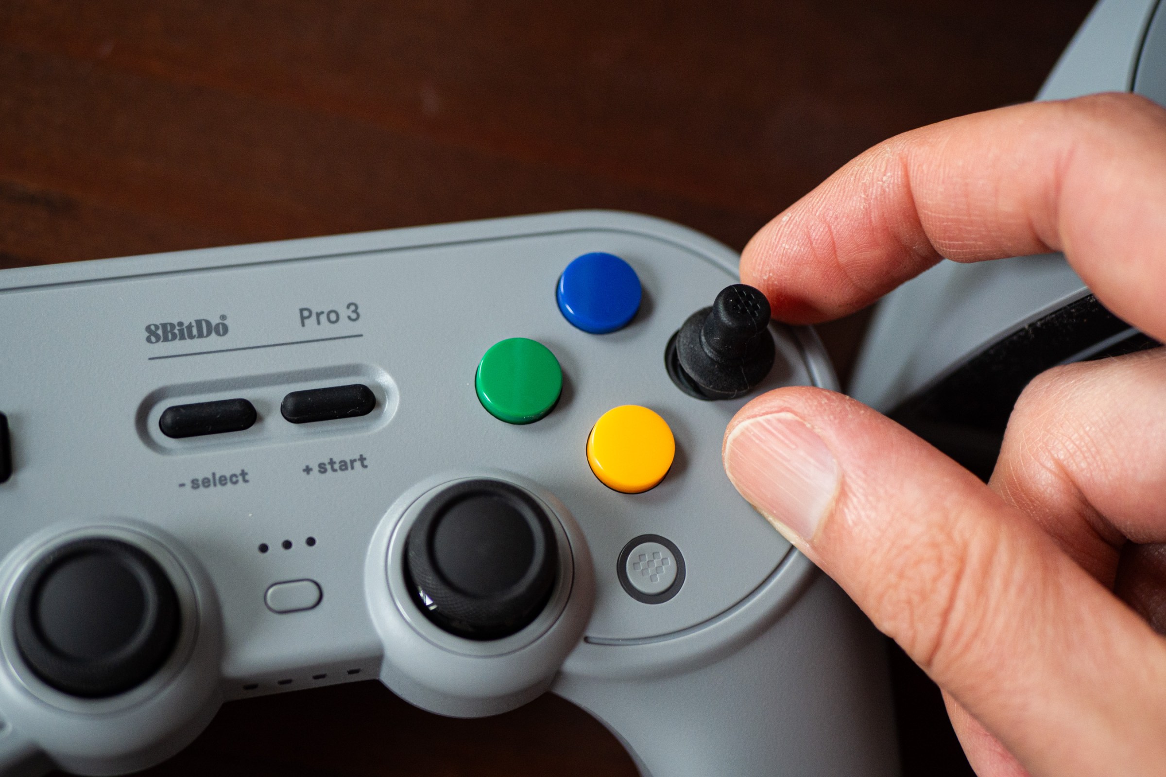 The button faces don’t come off easily without the included magnetized suction tool.