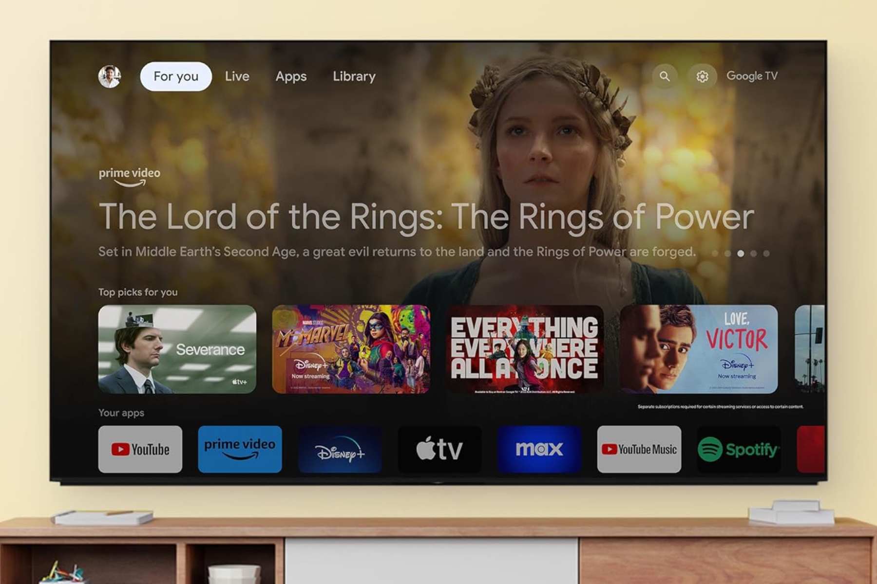 An image of Sony's XR A95L on top of a media center.