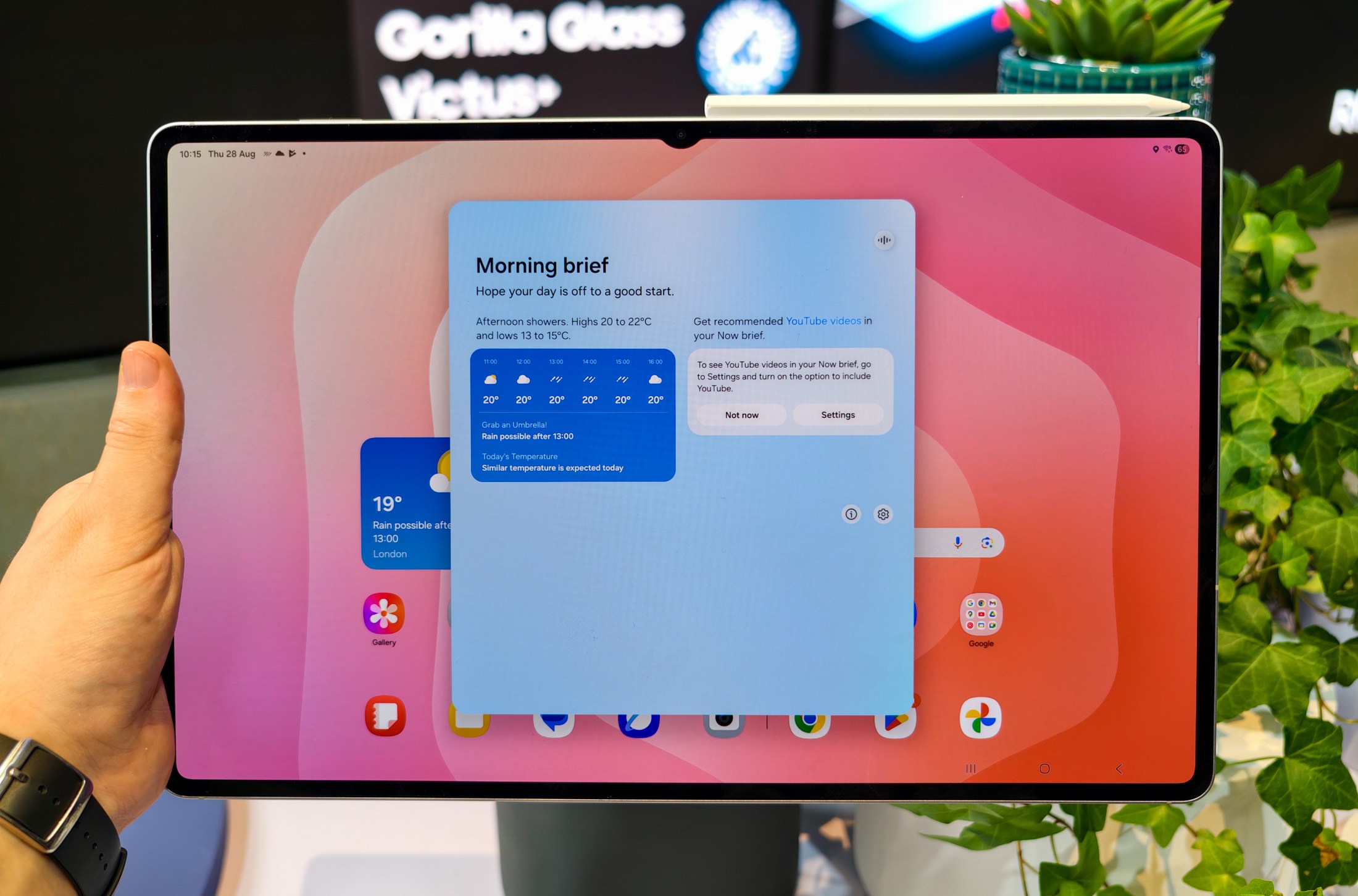 Samsung Galaxy Tab S11 Ultra with S Pen attached showing the Morning Brief