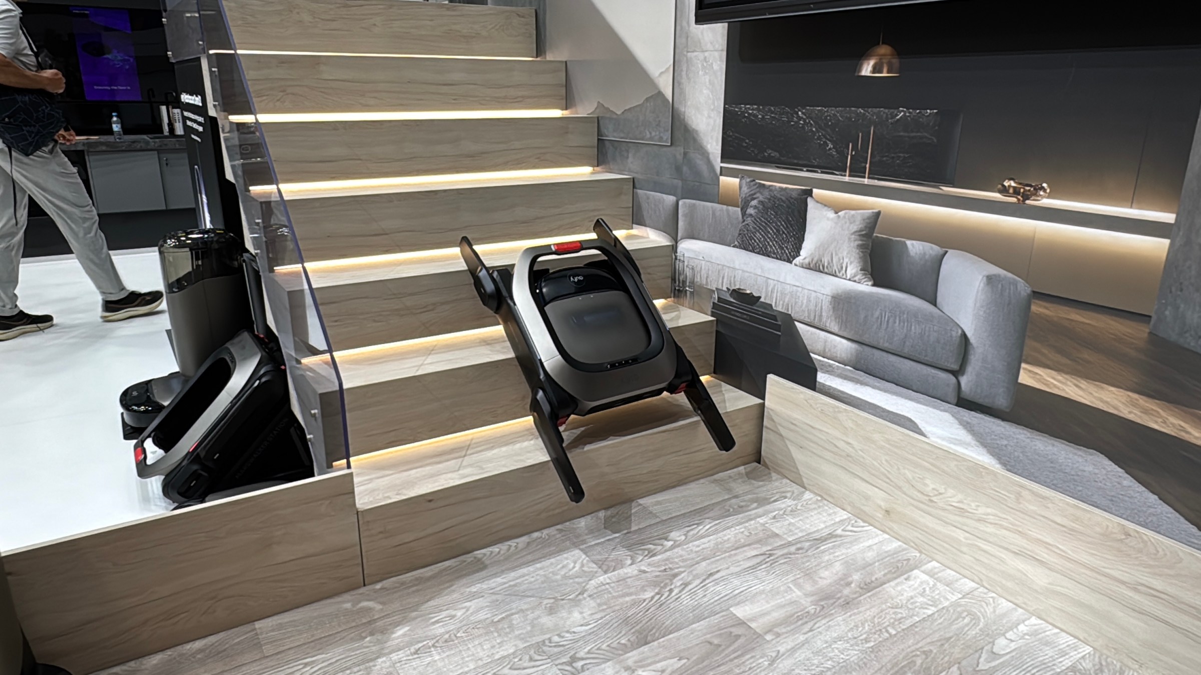 The Anker Eufy MarsWalker robovac stairlift being demonstrated at IFA 2025.