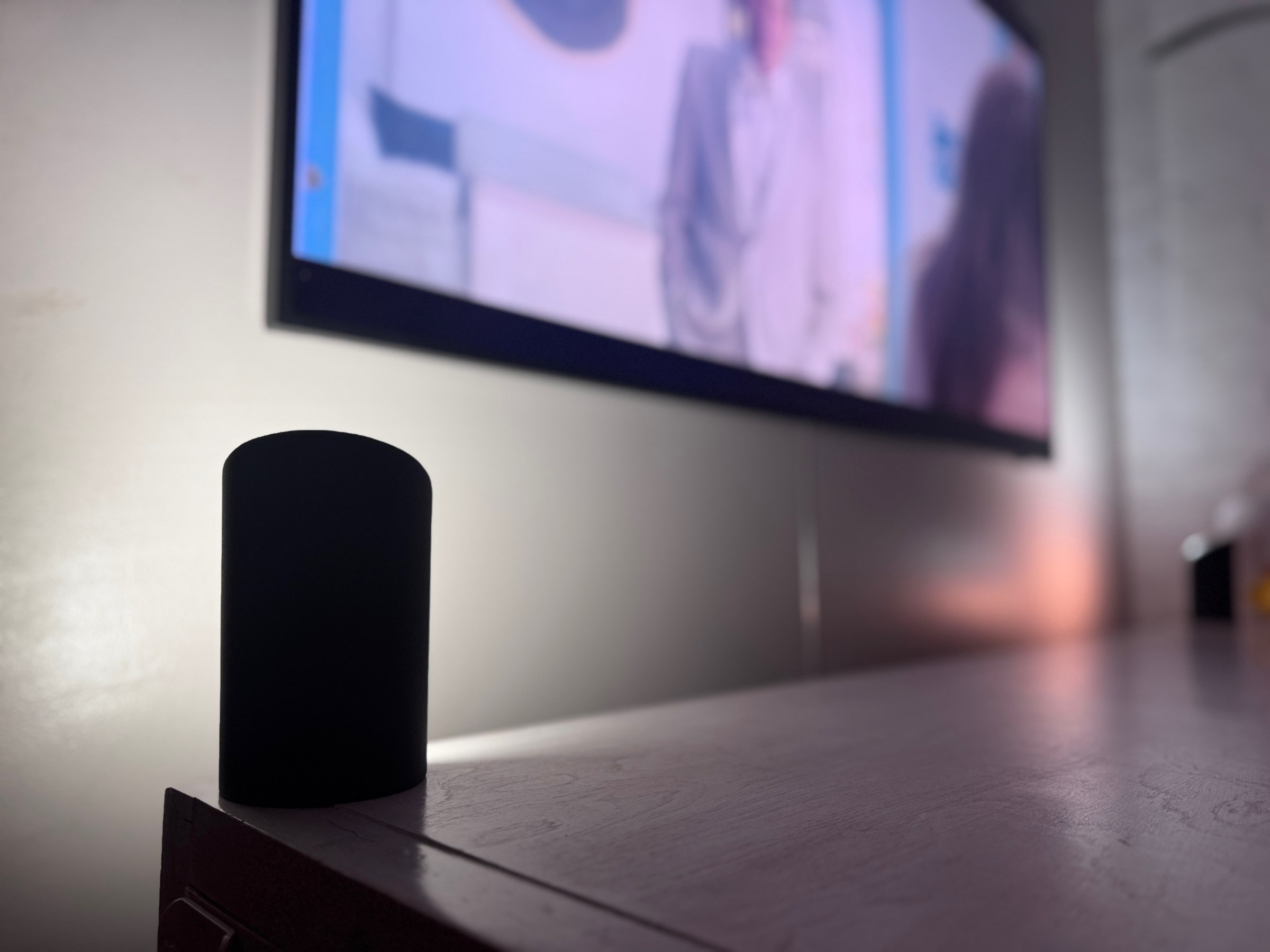 <em>The Hue Wall Washers work with the Hue Sync Box to cast gradient lighting around a TV, creating a more immersive feel.</em>