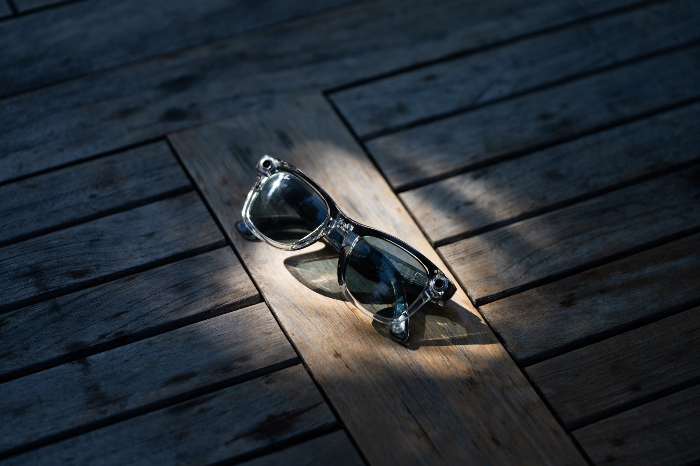 The Ray-Ban Meta smart glasses on a table.